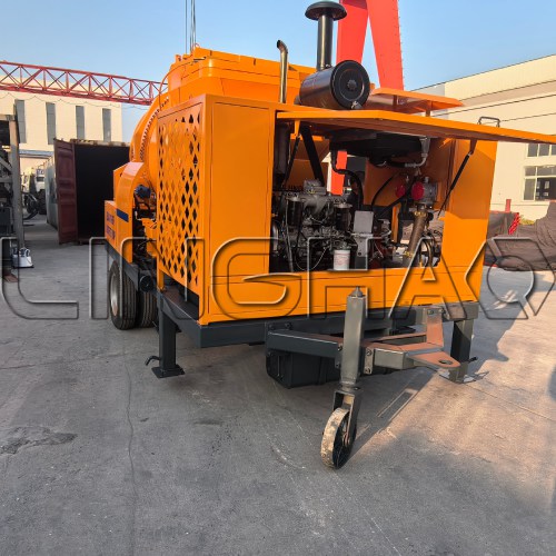 Two JBTS40-10-85R concrete mixer pumps loaded into a single 40ft high cube container at SanqGroup yard on February 8, 2026